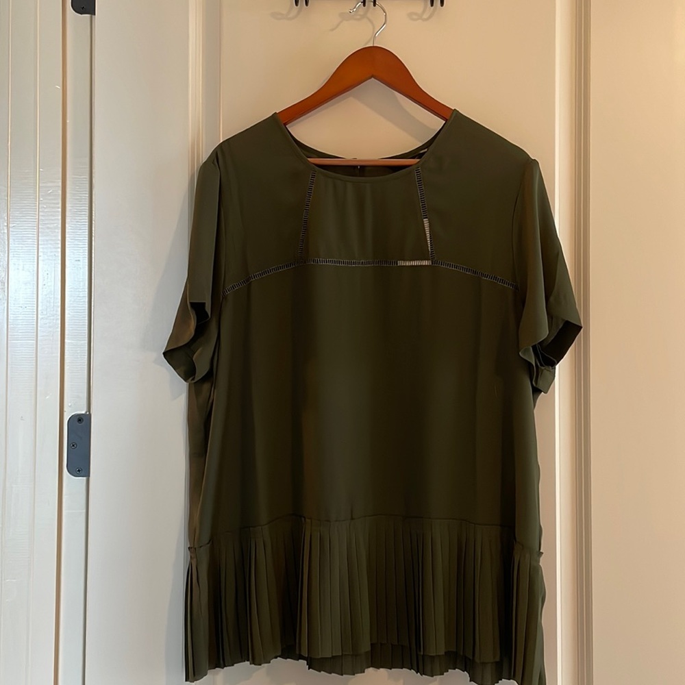 Olive green blouse with ruffle bottom